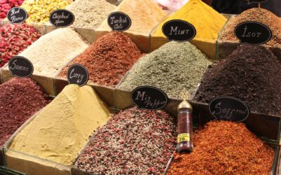 Diverse spices on display in Istanbul's vibrant market showcasing flavors and colors.