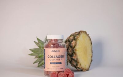 Collagen gummies bottle with a pineapple in a still life setup, promoting health and nutrition.