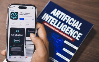 Smartphone displaying AI app with book on AI technology in background.
