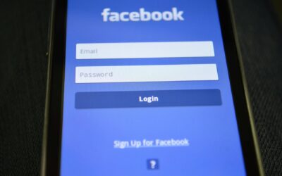 Close-up of a smartphone screen showing the Facebook login interface.