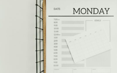 Top view of a minimalist schedule planner with Monday header. Perfect for organizing daily tasks with goals section.